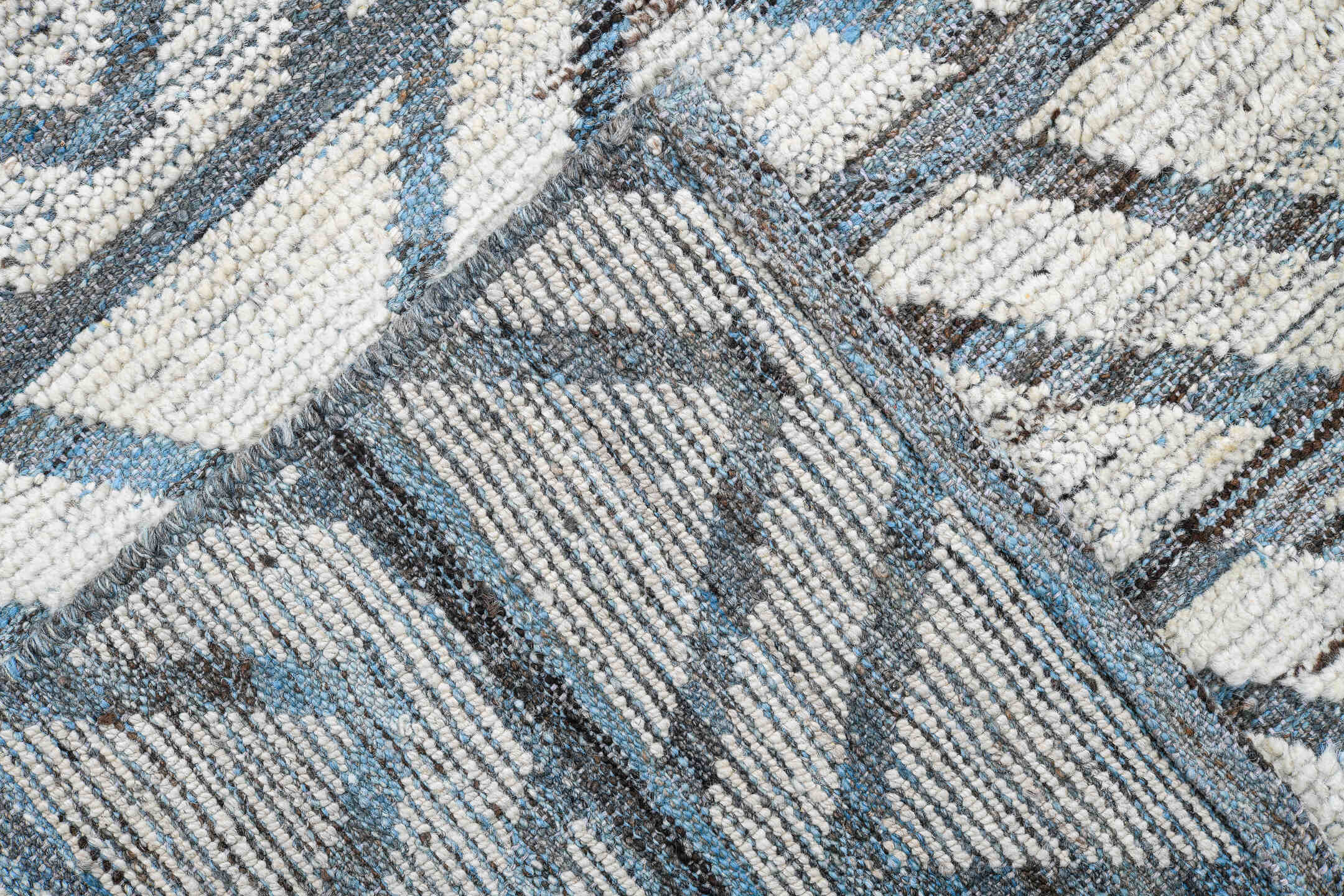 9' x 13' one-of-a-kind handmade vintage Tulu large size rug. Color palette: ivory, slate, blue, charcoal, gray, black