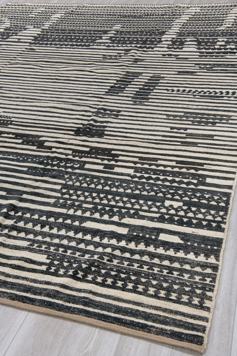 10' x 13' one-of-a-kind handmade vintage Tulu large size rug. Color palette: ivory, charcoal, black, gray