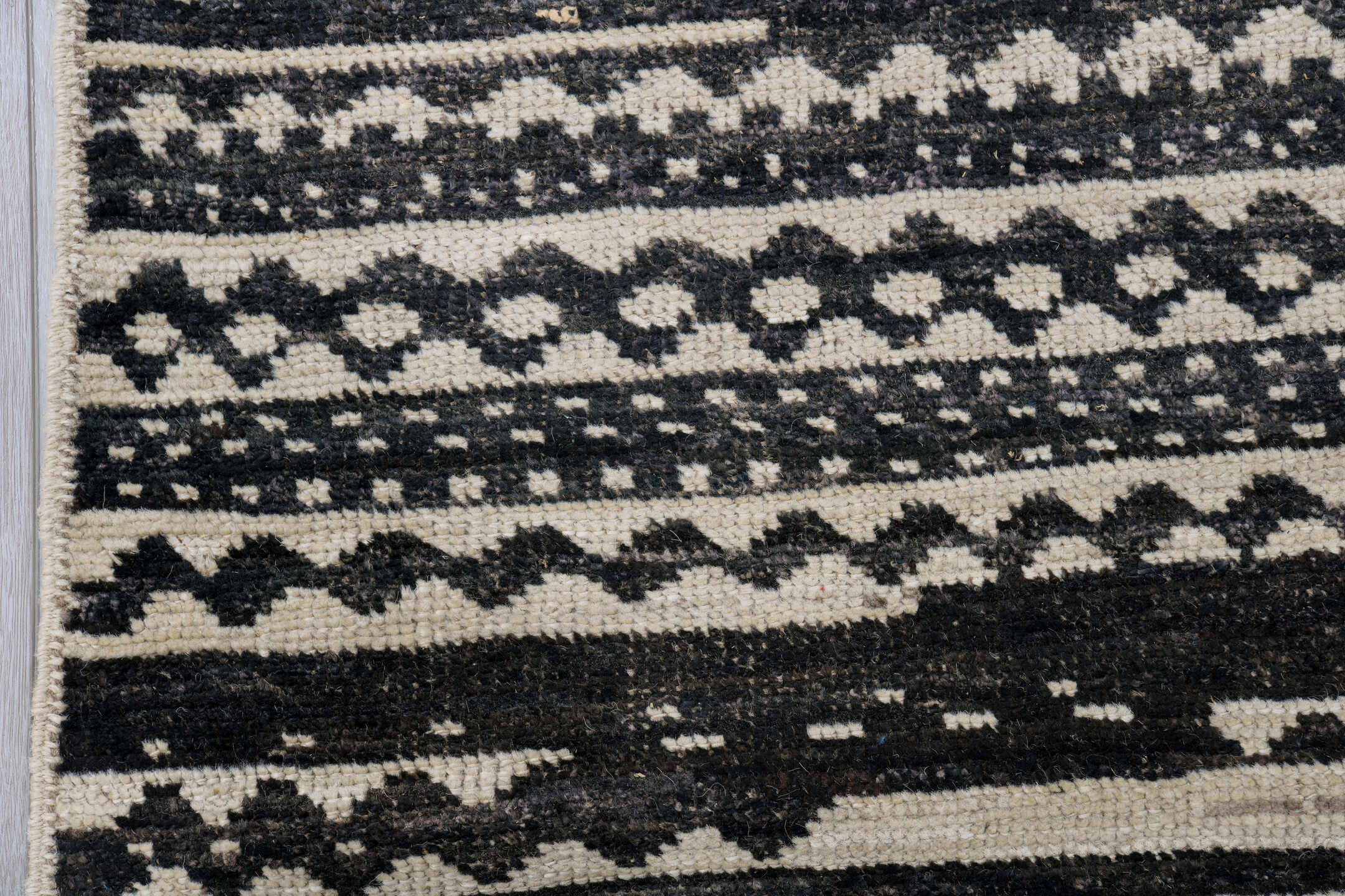 10' x 13' one-of-a-kind handmade vintage Tulu large size rug. Color palette: black, blue, brown, charcoal, dark gray