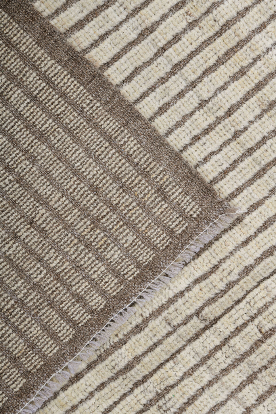 5' x 8' one-of-a-kind handmade vintage Tulu medium size rug. Color palette: ivory, taupe, brown, cream, beige, gray