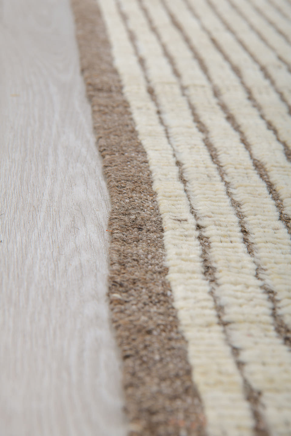 5' x 8' one-of-a-kind handmade vintage Tulu medium size rug. Color palette: ivory, taupe, brown, cream, beige, gray
