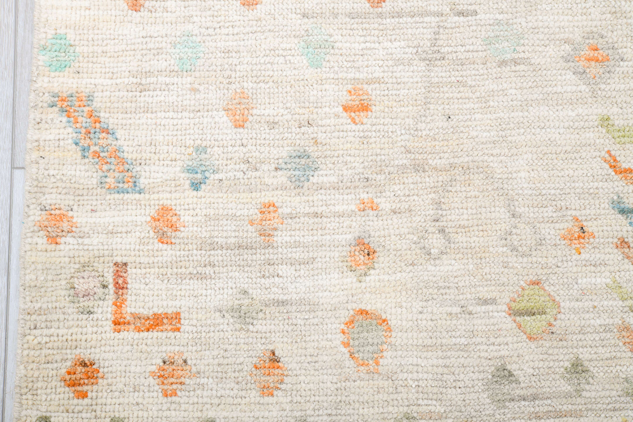 10' x 14' one-of-a-kind handmade vintage Tulu large size rug. Color palette: ivory, sage, aqua, apricot, taupe, pale gold
