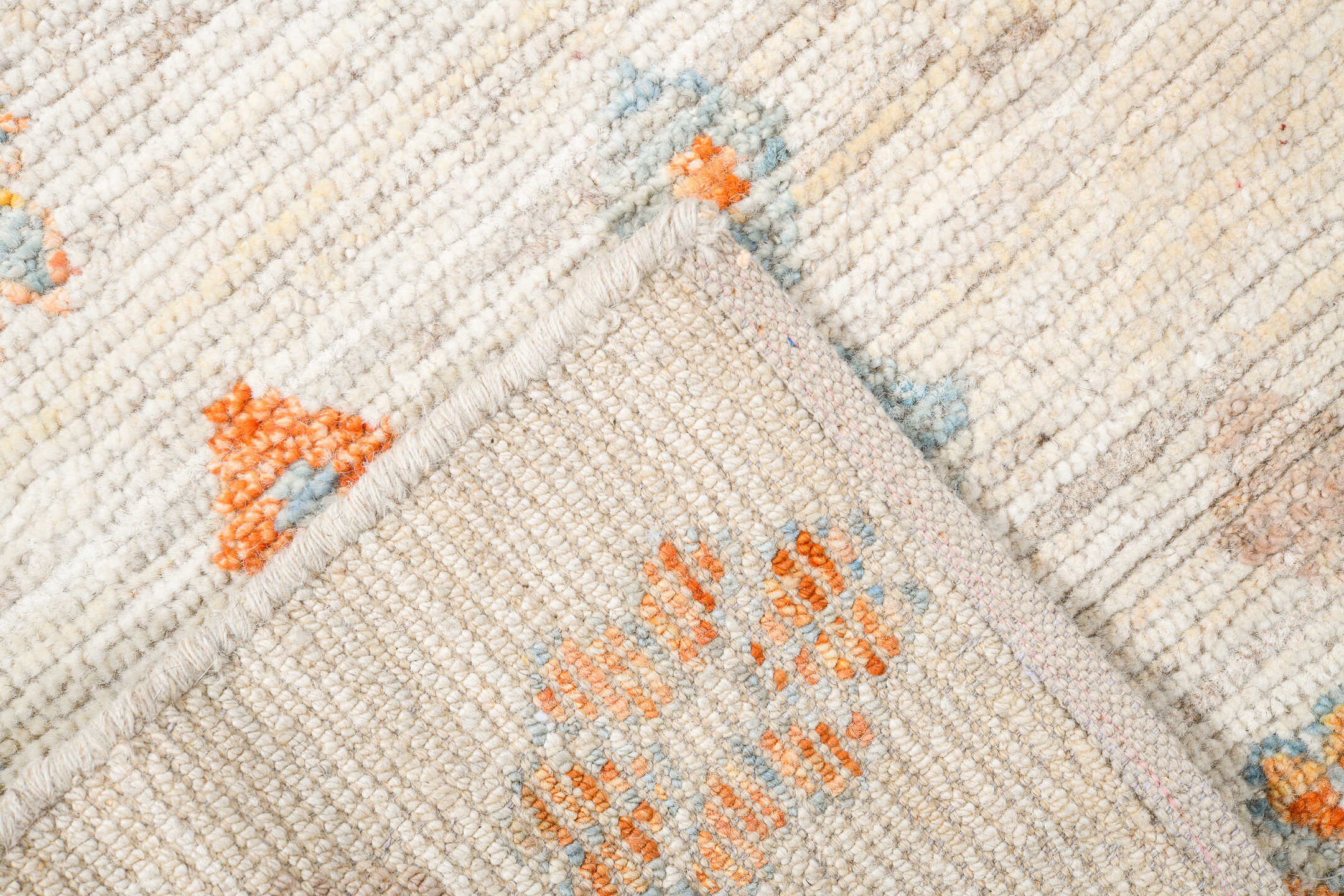 10' x 14' one-of-a-kind handmade vintage Tulu large size rug. Color palette: ivory, sage, aqua, apricot, taupe, pale gold
