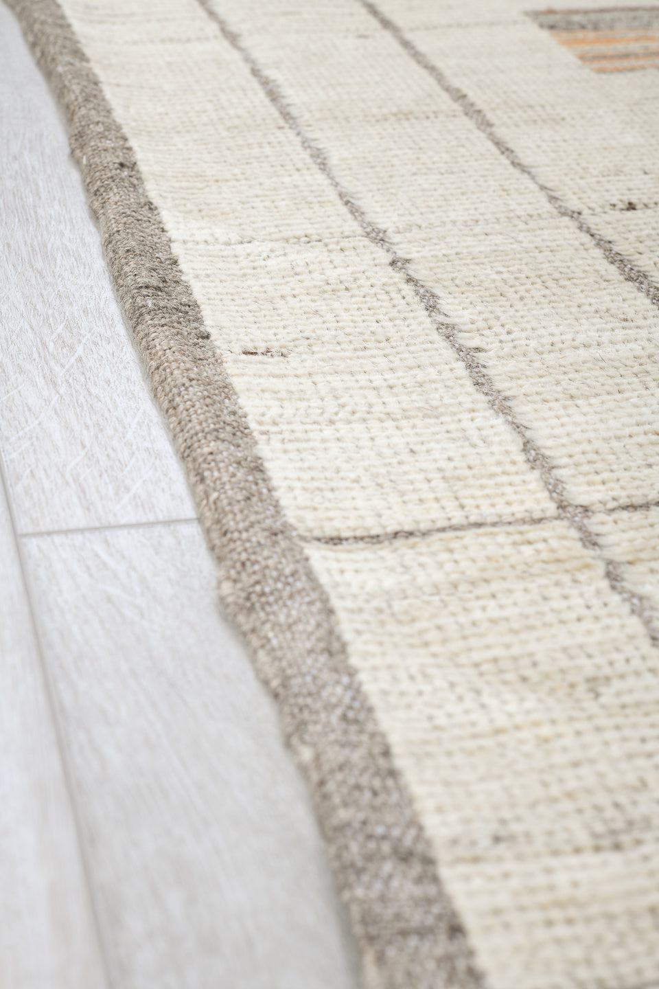 7' x 10' one-of-a-kind handmade vintage Tulu large size rug. Color palette: ivory, taupe, charcoal, camel, sky_blue, rose