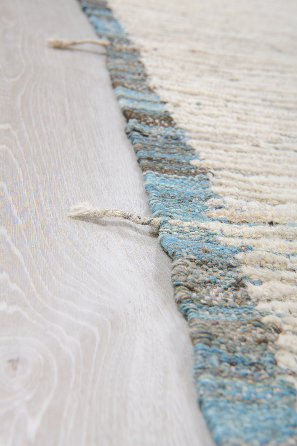 11' x 12' one-of-a-kind handmade vintage Tulu oversize rug. Color palette: ivory, charcoal, slate, cream, gray, black