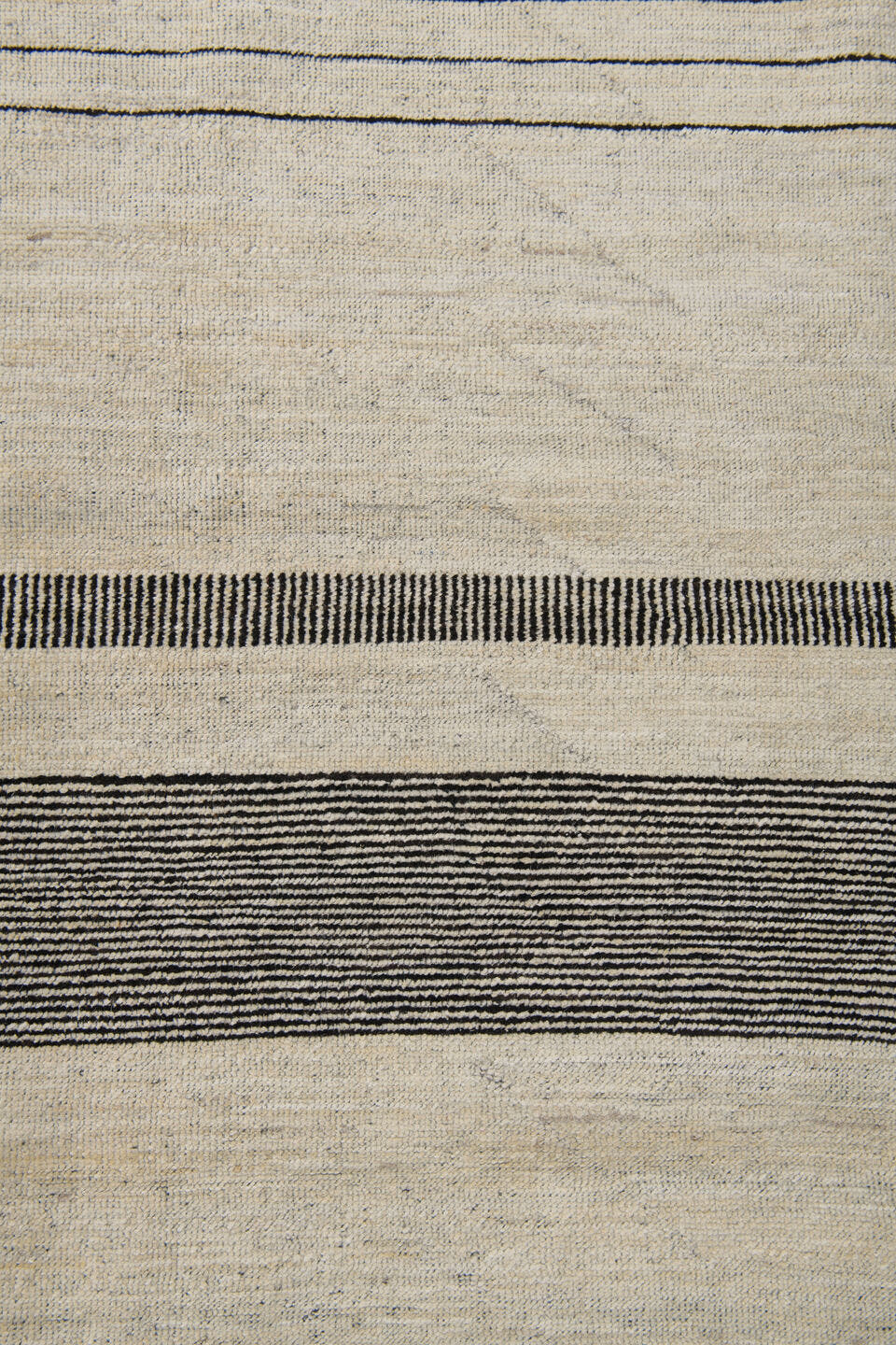8' x 12' one-of-a-kind handmade vintage Tulu large size rug. Color palette: ivory, charcoal, cream, taupe, black, gray