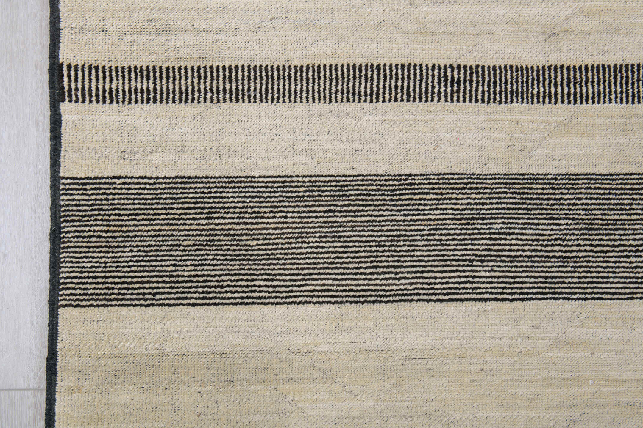 8' x 12' one-of-a-kind handmade vintage Tulu large size rug. Color palette: ivory, charcoal, cream, taupe, black, gray