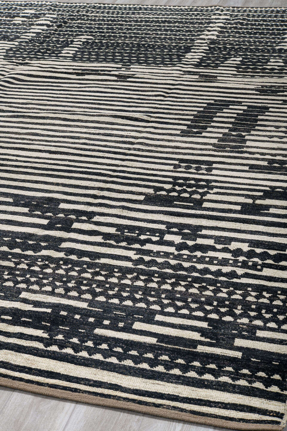 9' x 11' one-of-a-kind handmade vintage Tulu large size rug. Color palette: ivory, charcoal, black, taupe, gray, beige