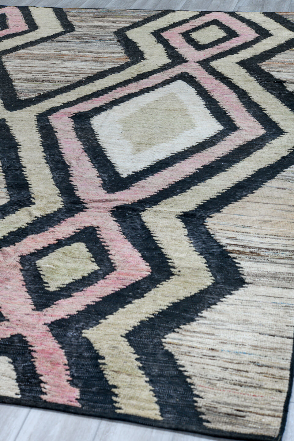 9' x 12' one-of-a-kind handmade vintage Tulu large size rug. Color palette: ivory, charcoal, blush, taupe, gray, black, pink