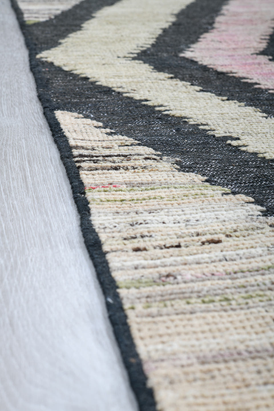 9' x 12' one-of-a-kind handmade vintage Tulu large size rug. Color palette: ivory, charcoal, blush, taupe, gray, black, pink