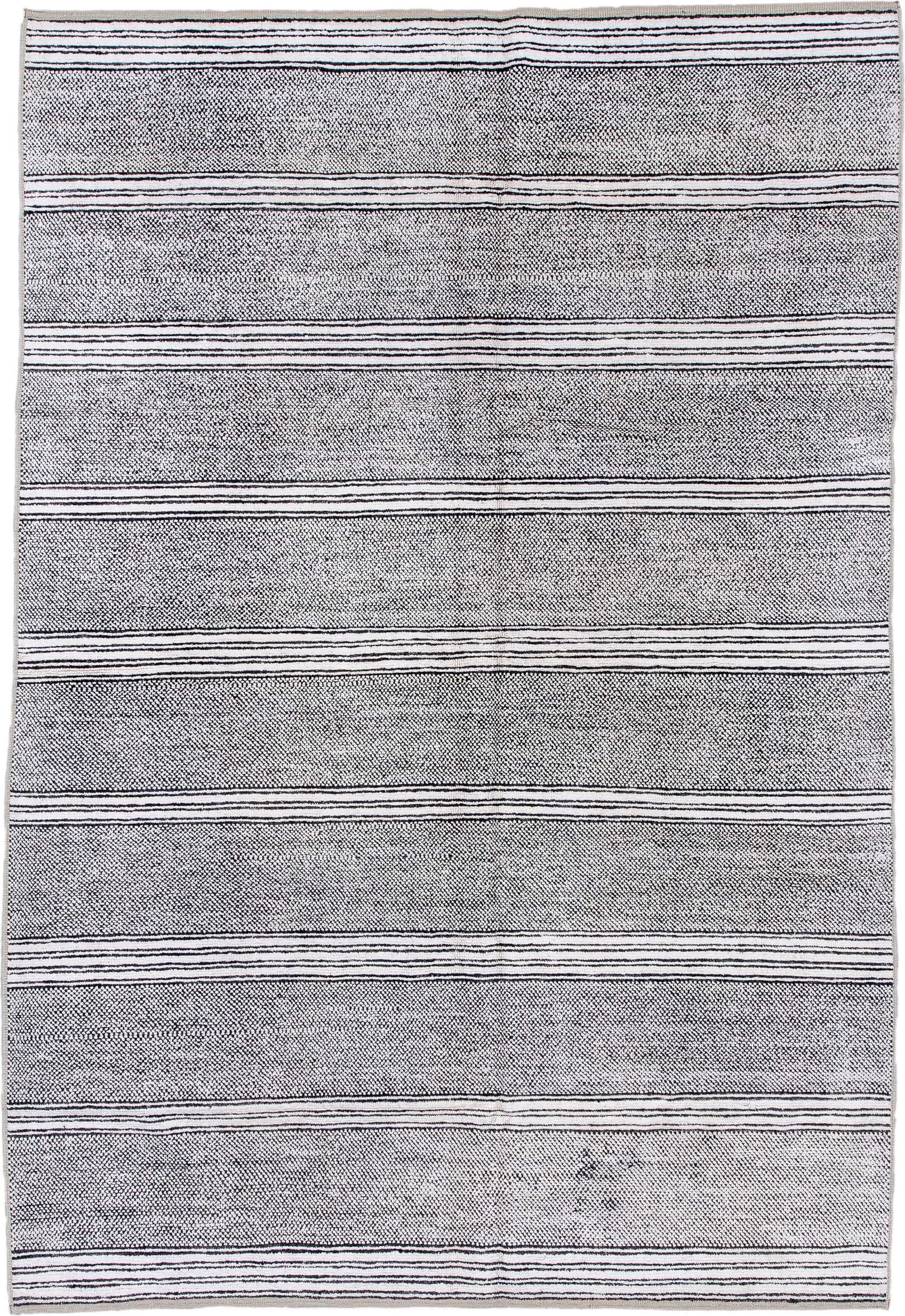 6' x 9' one-of-a-kind handmade vintage Tulu medium size rug. Color palette: ivory, charcoal, gray, black