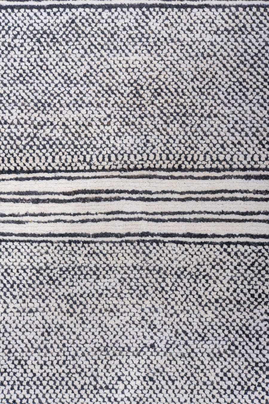6' x 9' one-of-a-kind handmade vintage Tulu medium size rug. Color palette: ivory, charcoal, gray, black