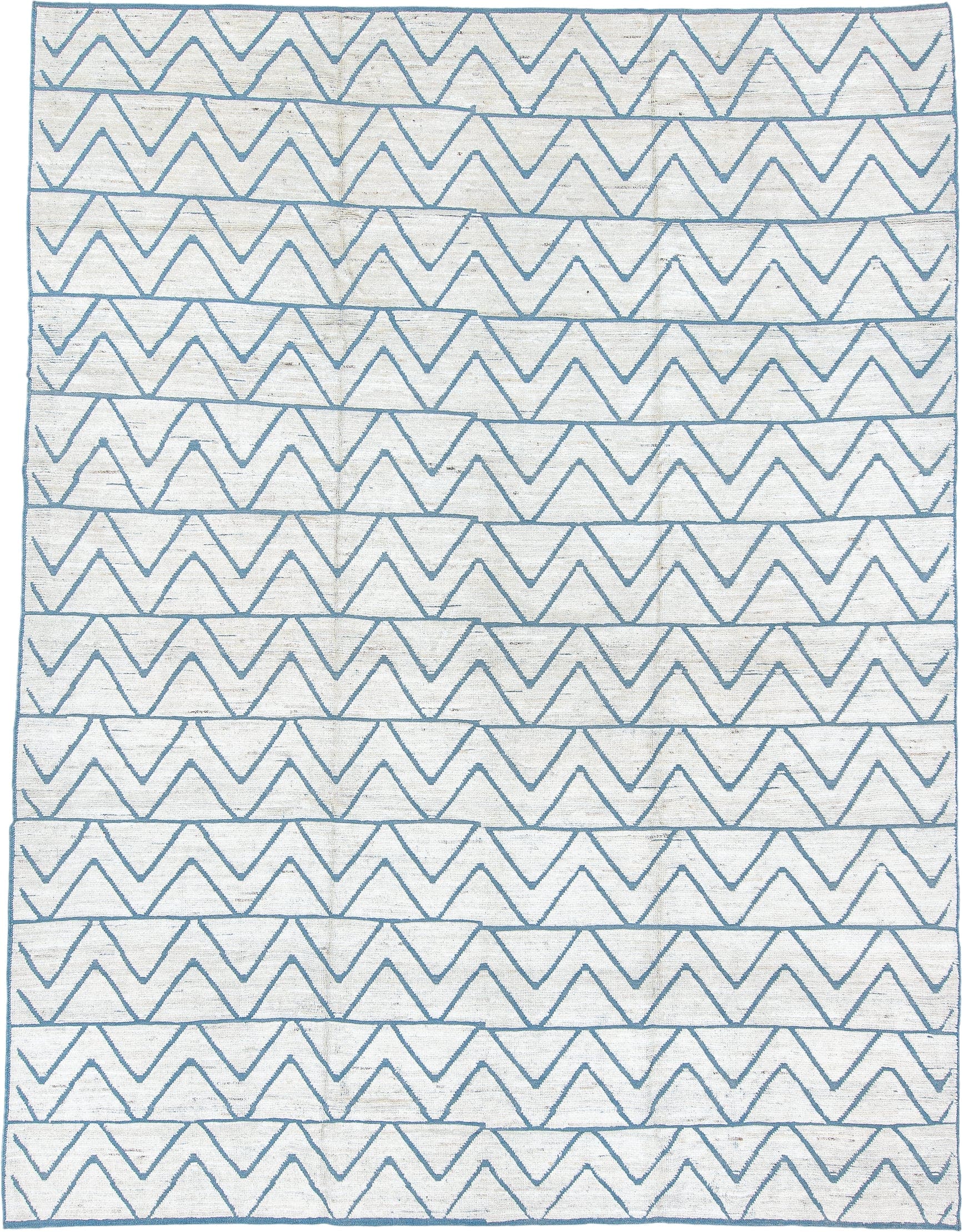 9' x 12' one-of-a-kind handmade vintage Tulu large size rug. Color palette: ivory, sky_blue, pale_blue, light blue