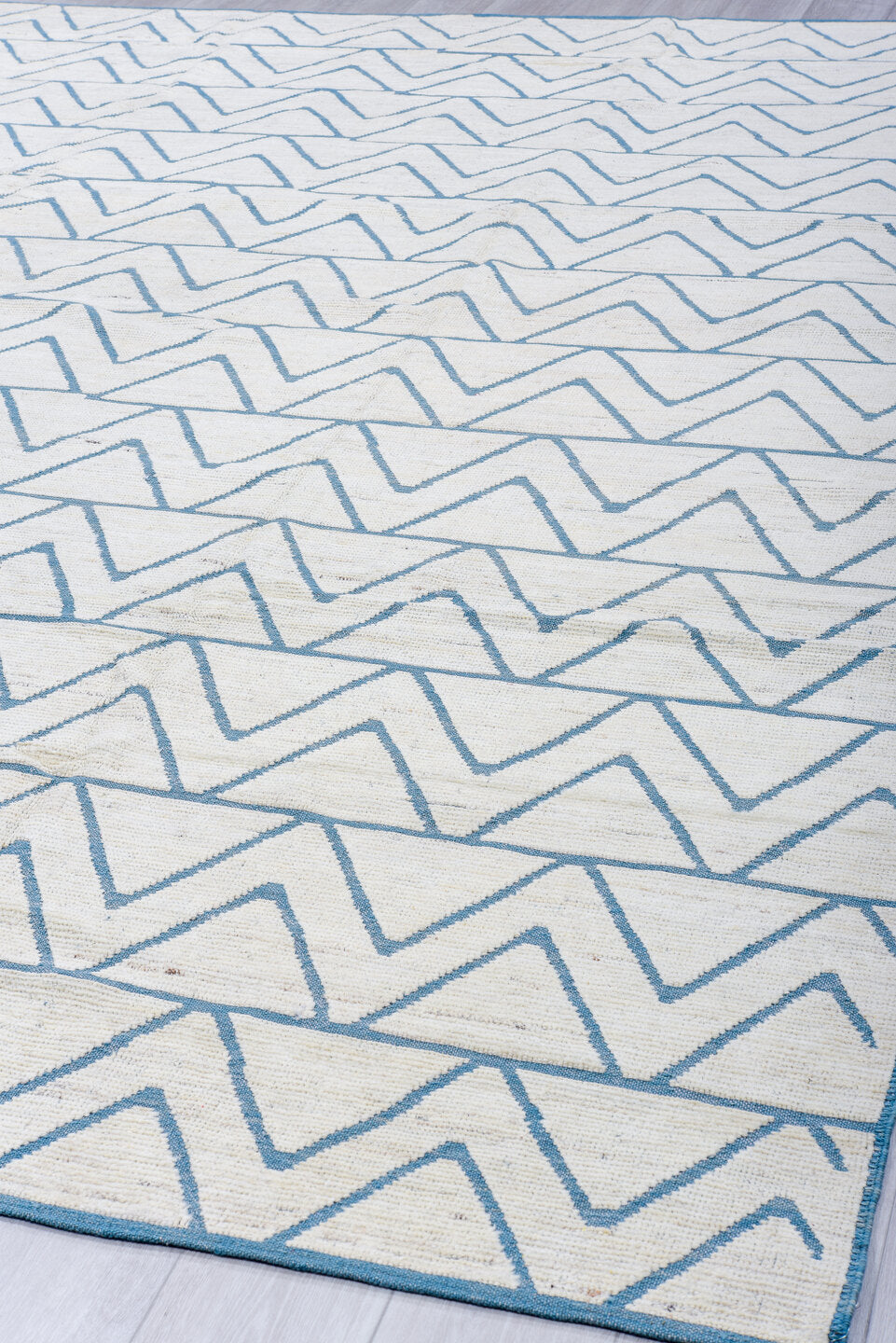 9' x 12' one-of-a-kind handmade vintage Tulu large size rug. Color palette: ivory, sky_blue, pale_blue, light blue