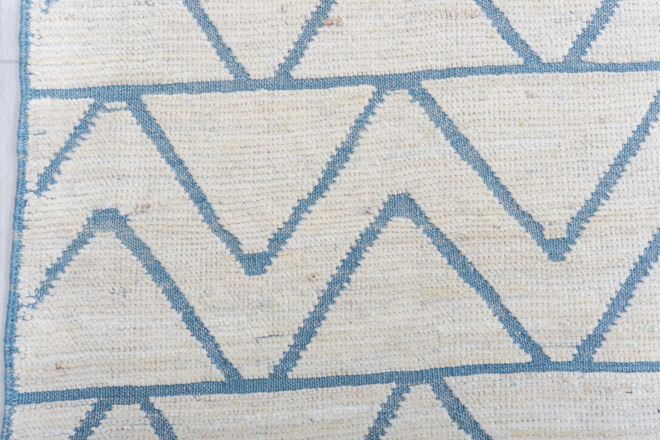 9' x 12' one-of-a-kind handmade vintage Tulu large size rug. Color palette: ivory, sky_blue, pale_blue, light blue