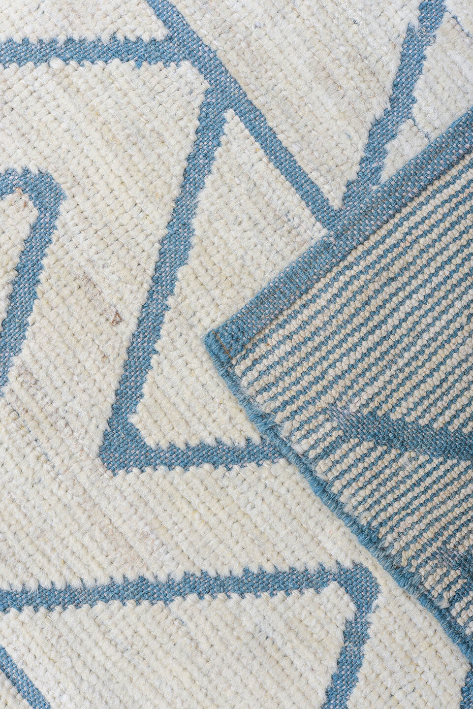 9' x 12' one-of-a-kind handmade vintage Tulu large size rug. Color palette: ivory, sky_blue, pale_blue, light blue