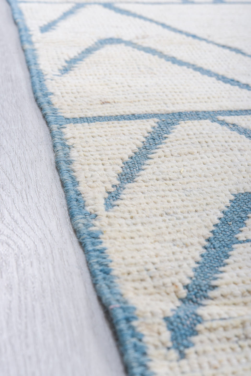 9' x 12' one-of-a-kind handmade vintage Tulu large size rug. Color palette: ivory, sky_blue, pale_blue, light blue