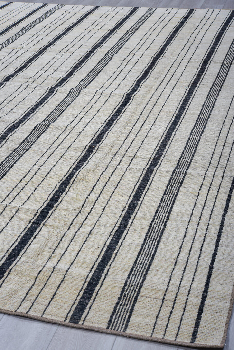 8' x 12' one-of-a-kind handmade vintage Tulu large size rug. Color palette: ivory, charcoal, black, cream, gray