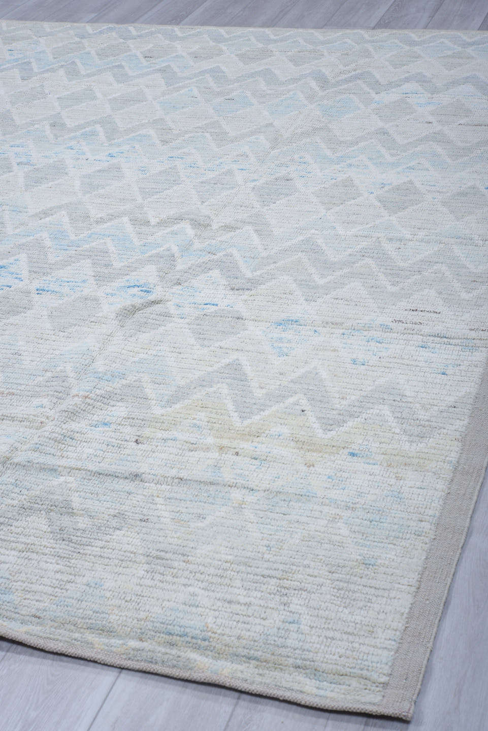 8' x 10' one-of-a-kind handmade vintage Tulu large size rug. Color palette: ivory, pale blue, light gray, cream, light blue