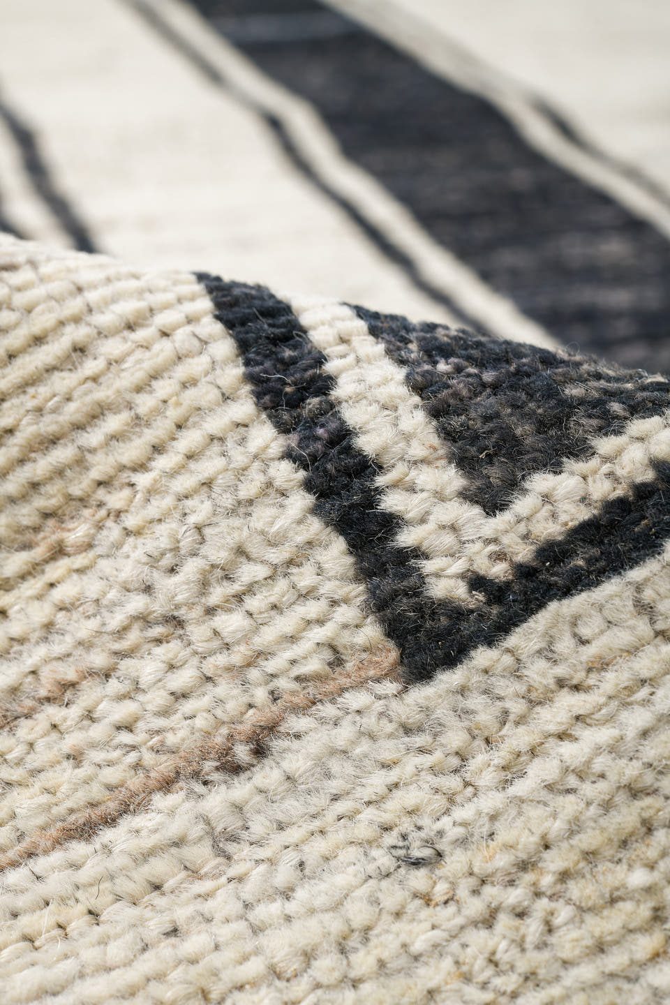 9' x 11' one-of-a-kind handmade vintage Tulu large size rug. Color palette: ivory, charcoal, cream, taupe, black, gray