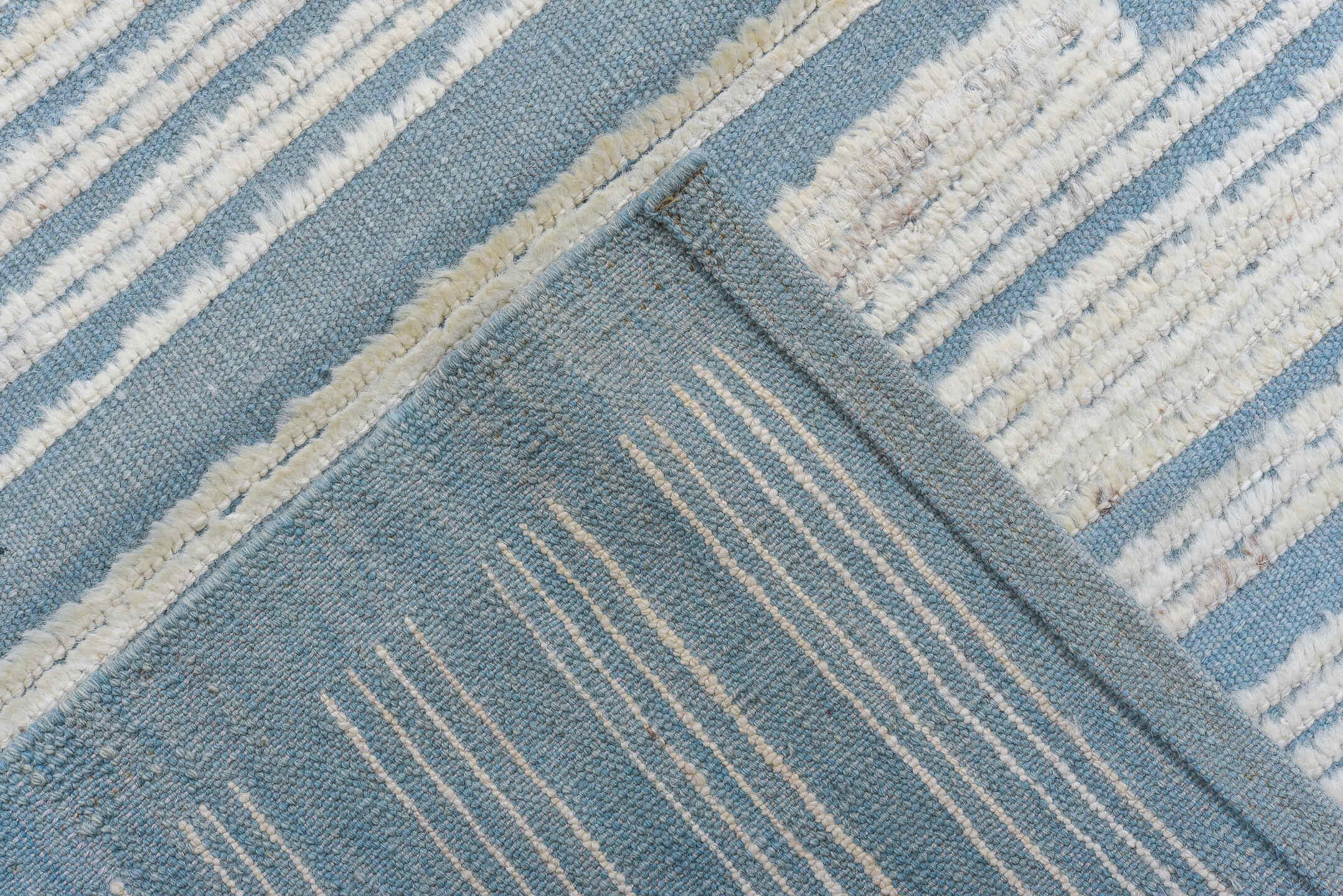 9' x 12' one-of-a-kind handmade vintage Tulu large size rug. Color palette: ivory, sky blue, slate, light blue, gray