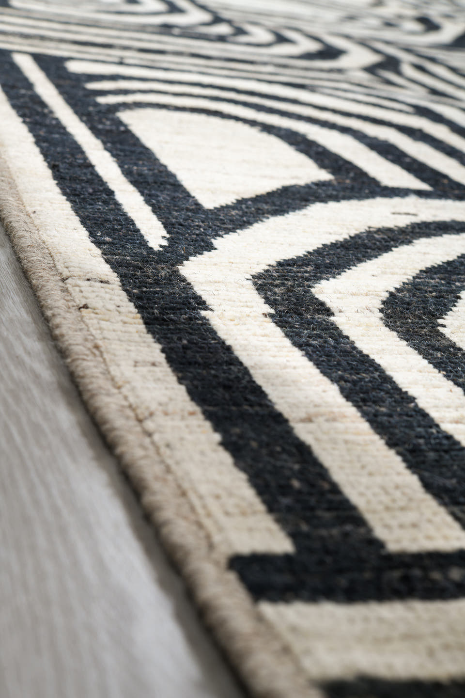 16' x 21' one-of-a-kind handmade vintage Tulu oversize rug. Color palette: ivory, charcoal, gray, black