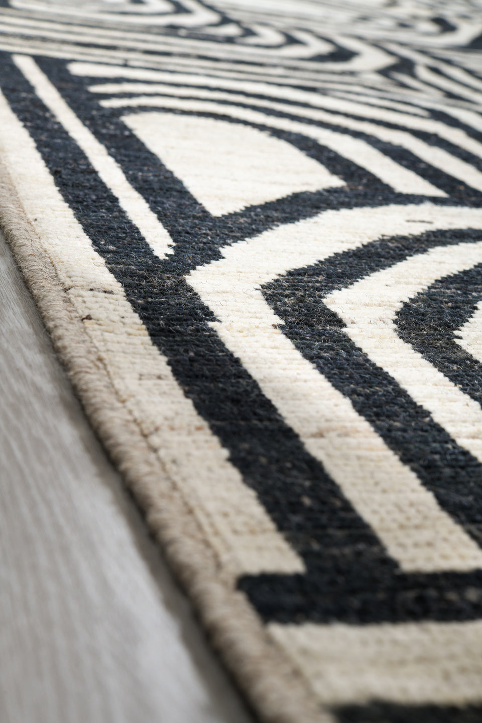 16' x 21' one-of-a-kind handmade vintage Tulu oversize rug. Color palette: ivory, charcoal, gray, black