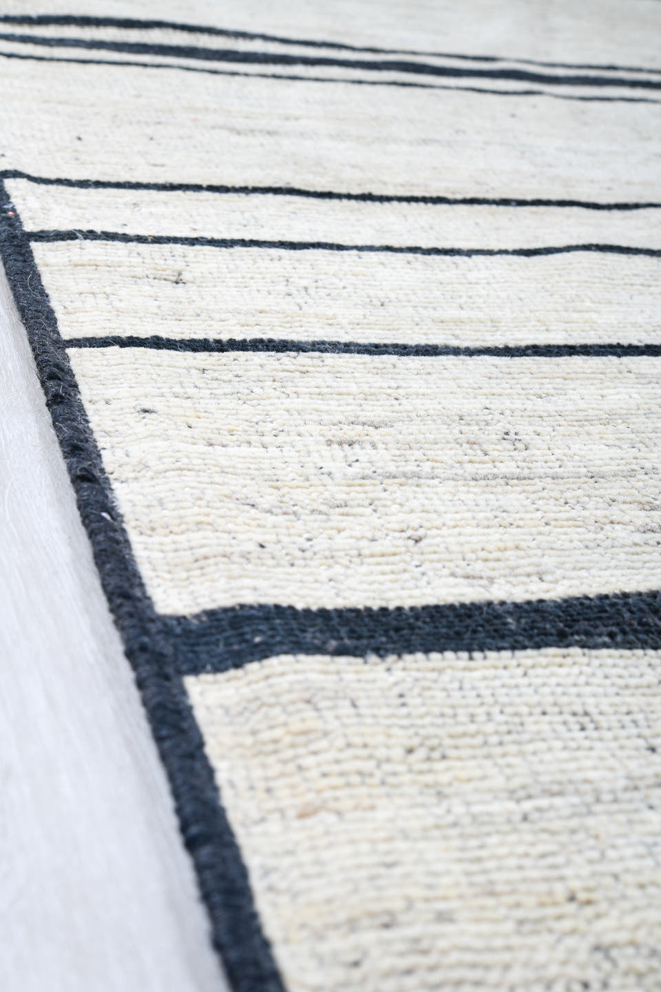 13' x 19' one-of-a-kind handmade vintage Tulu oversize rug. Color palette: ivory, charcoal, teal, taupe, gray, black, beige