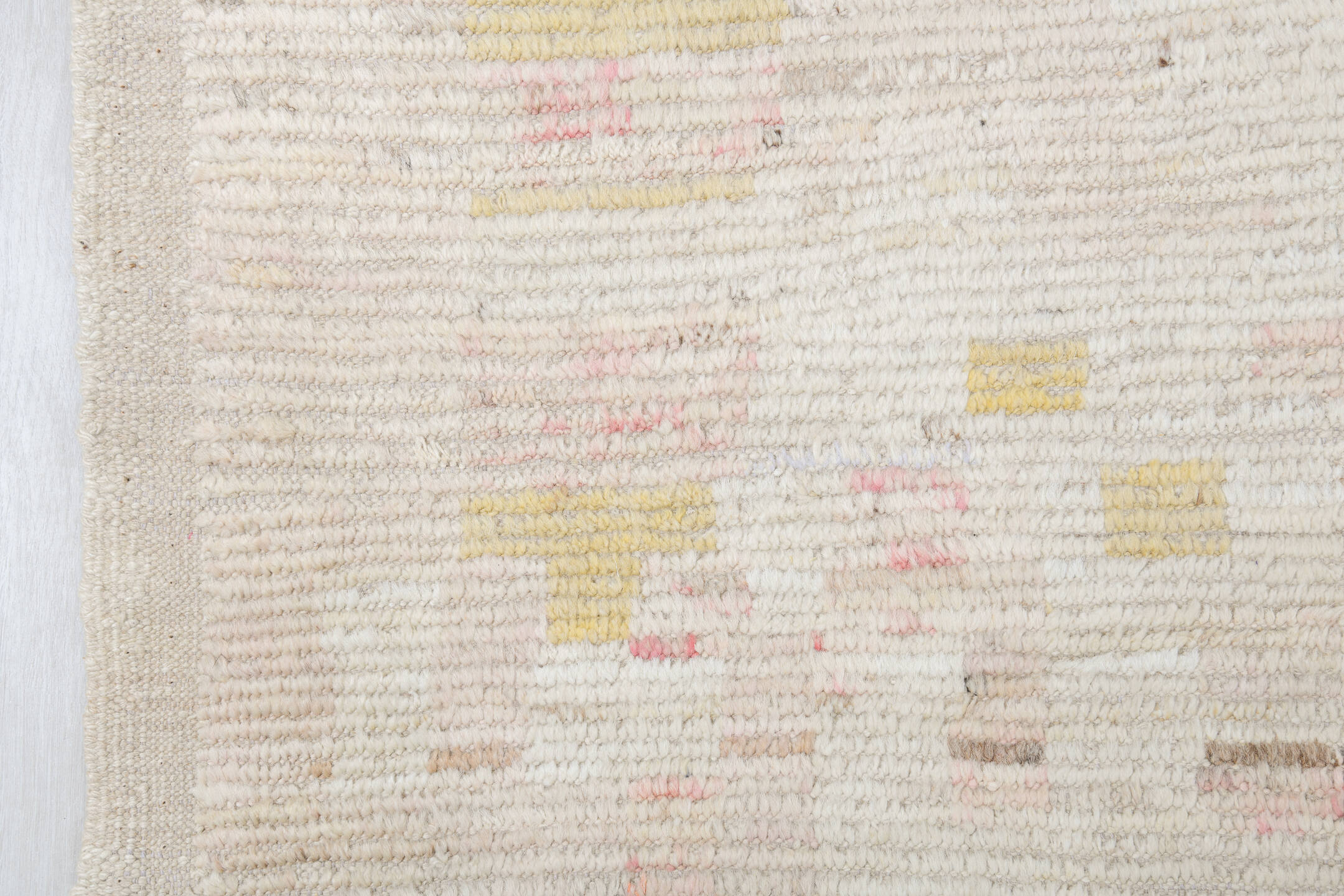 12' x 16' one-of-a-kind handmade vintage Tulu oversize rug. Color palette: ivory, charcoal, cream, pale gold, blush, taupe