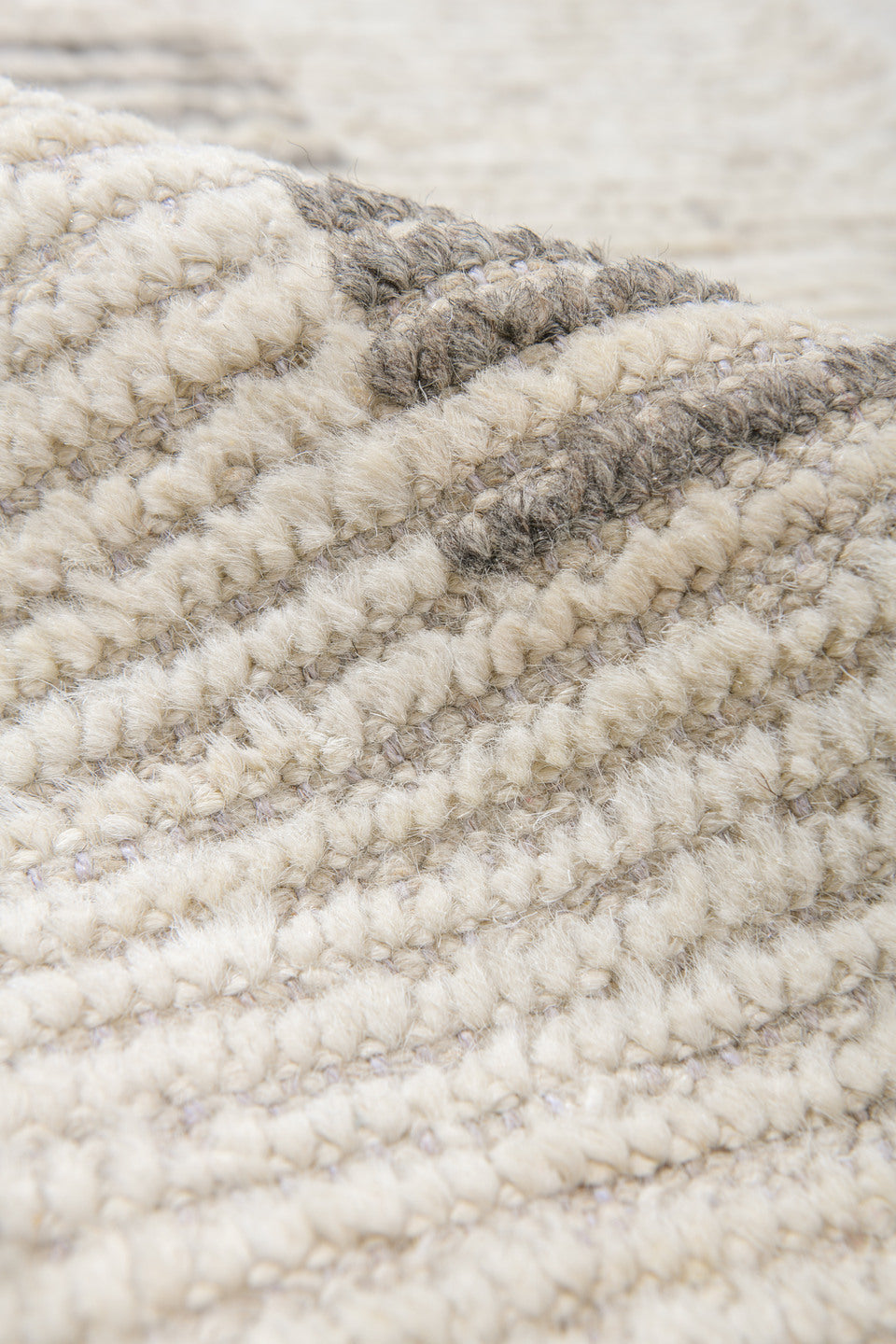 12' x 16' one-of-a-kind handmade vintage Tulu oversize rug. Color palette: ivory, charcoal, cream, pale gold, blush, taupe