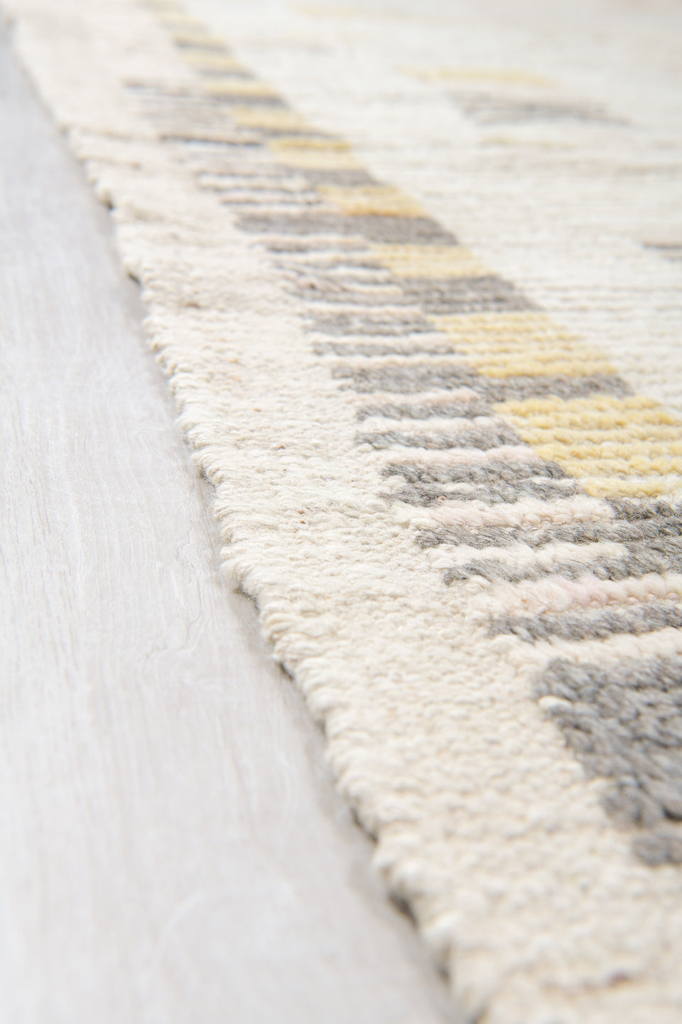 12' x 16' one-of-a-kind handmade vintage Tulu oversize rug. Color palette: ivory, charcoal, cream, pale gold, blush, taupe