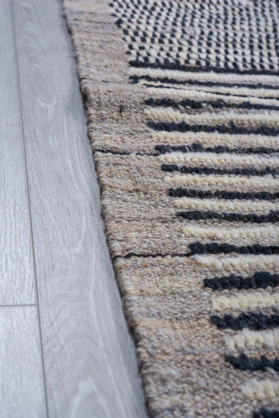 9' x 12' one-of-a-kind handmade vintage Tulu large size rug. Color palette: charcoal, ivory, gray, black