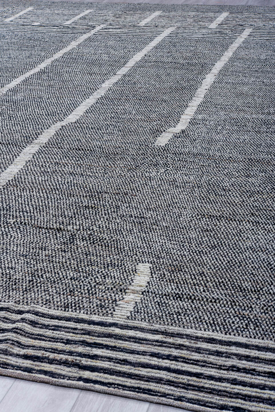 13' x 15' one-of-a-kind handmade vintage Tulu oversize rug. Color palette: gray, charcoal, ivory, slate, black
