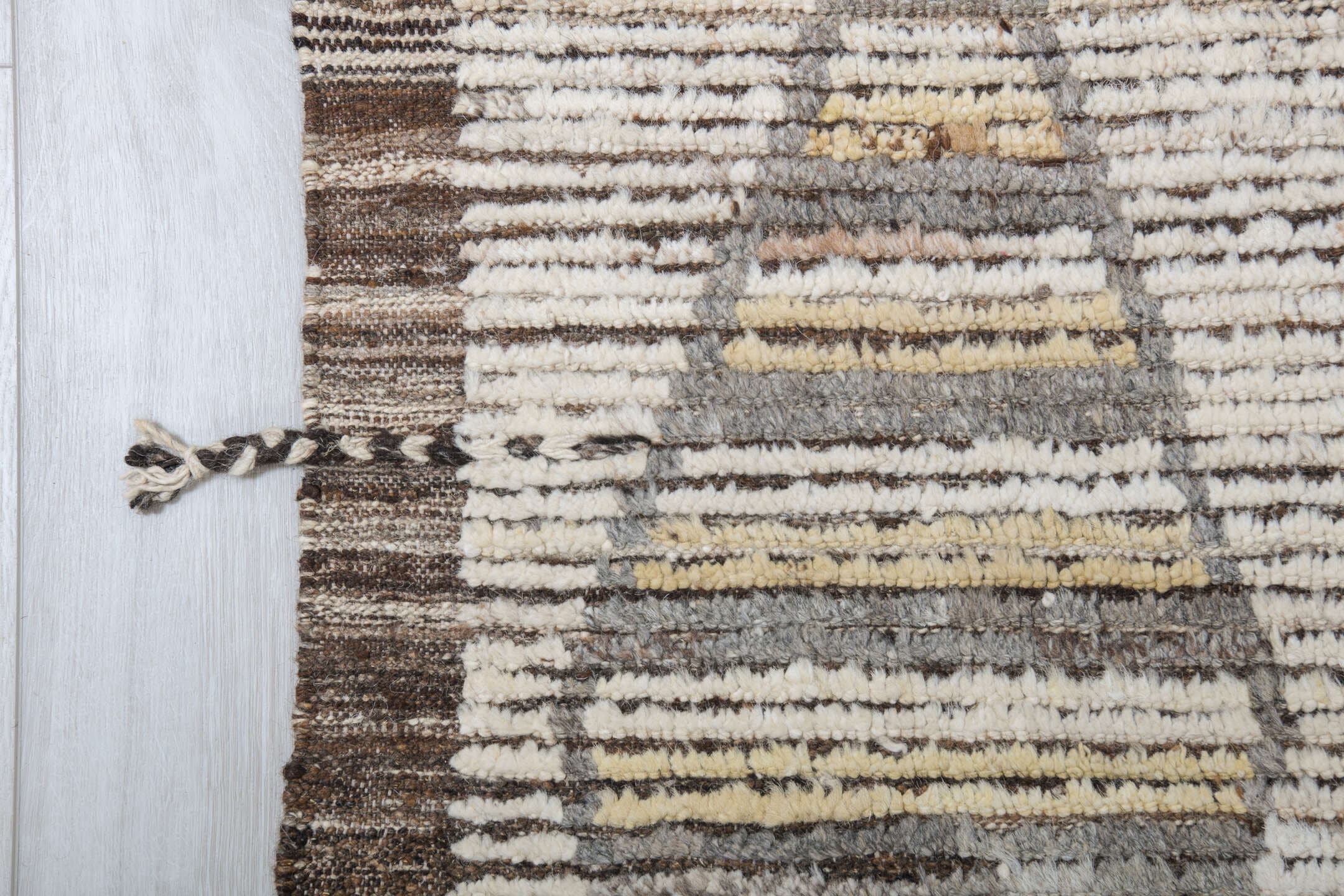 13' x 16' one-of-a-kind handmade vintage Tulu oversize rug. Color palette: ivory, taupe, brown, pale gold, charcoal, beige