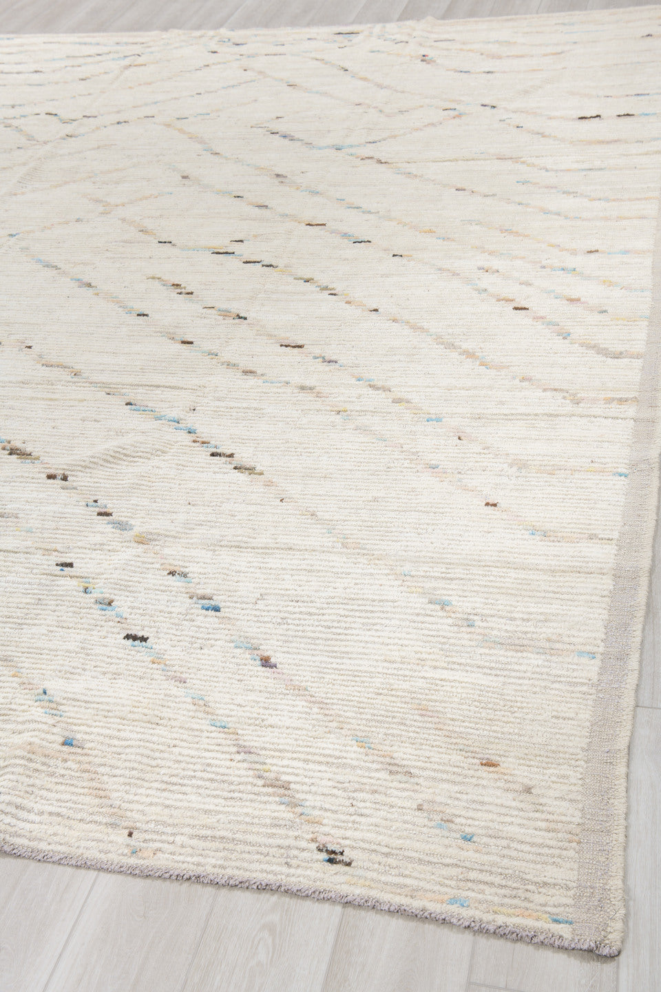 10' x 13' one-of-a-kind handmade vintage Tulu large size rug. Color palette: ivory, cream, charcoal, pale blue, taupe, beige
