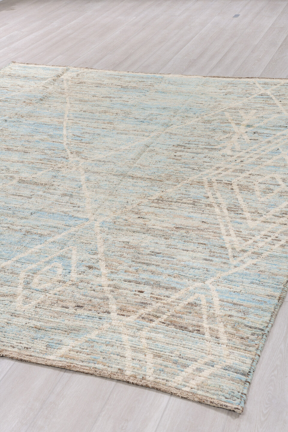 8' x 9' one-of-a-kind handmade vintage Tulu rug. Color palette: ivory, taupe, pale blue, beige, gray, cream, light blue