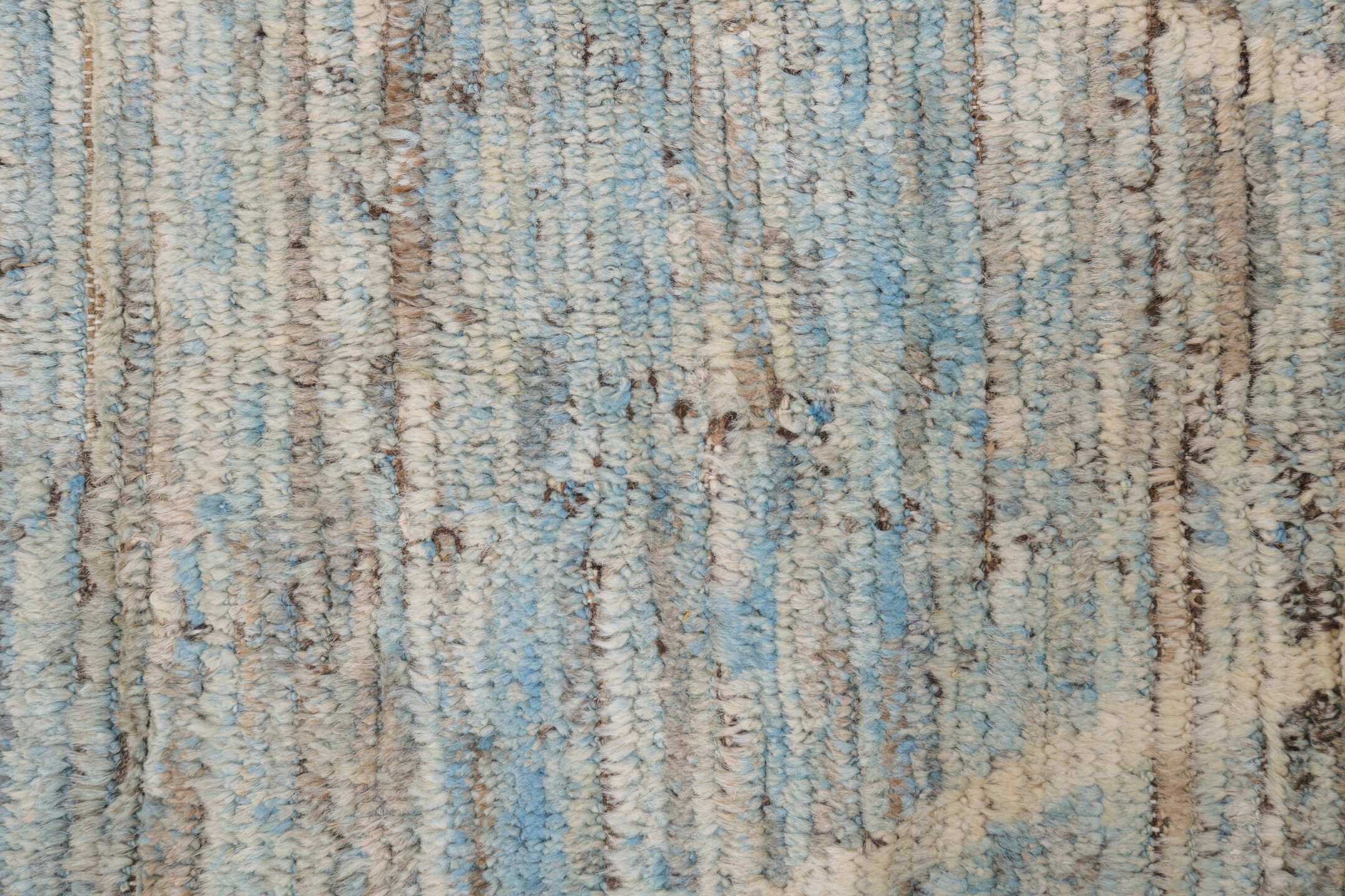 8' x 9' one-of-a-kind handmade vintage Tulu rug. Color palette: ivory, taupe, pale blue, beige, gray, cream, light blue