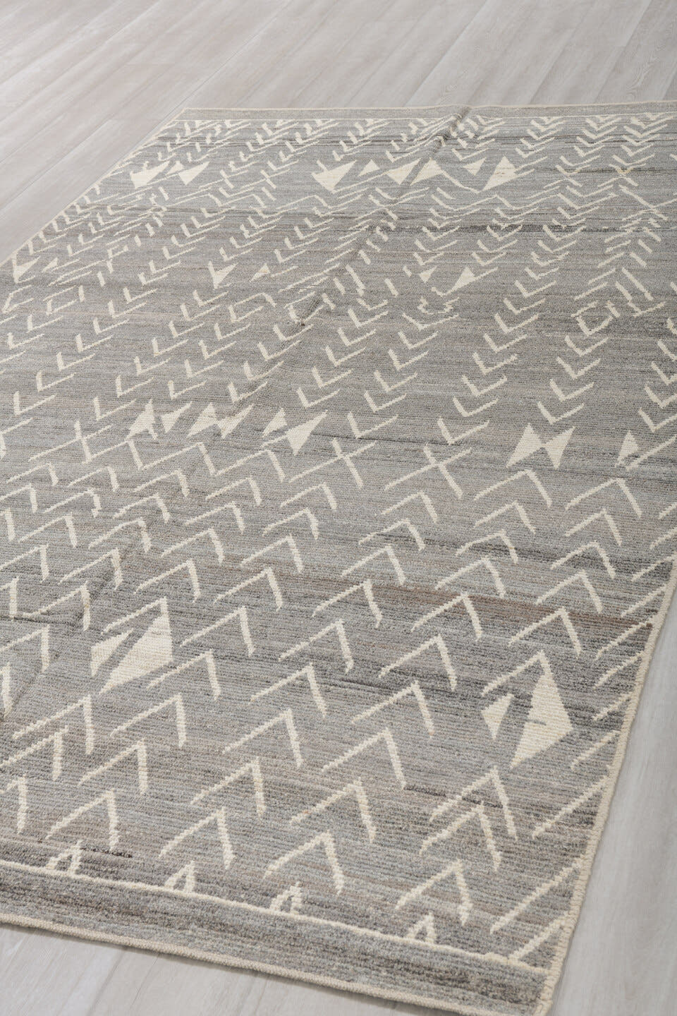 6' x 9' one-of-a-kind handmade vintage Tulu medium size rug. Color palette: gray, ivory, taupe, charcoal, beige, black