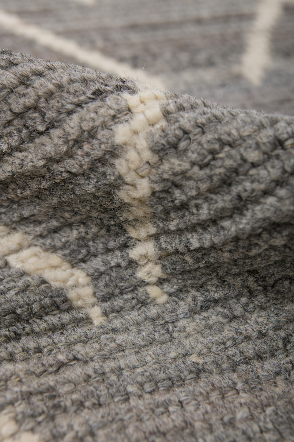 6' x 9' one-of-a-kind handmade vintage Tulu medium size rug. Color palette: gray, ivory, taupe, charcoal, beige, black