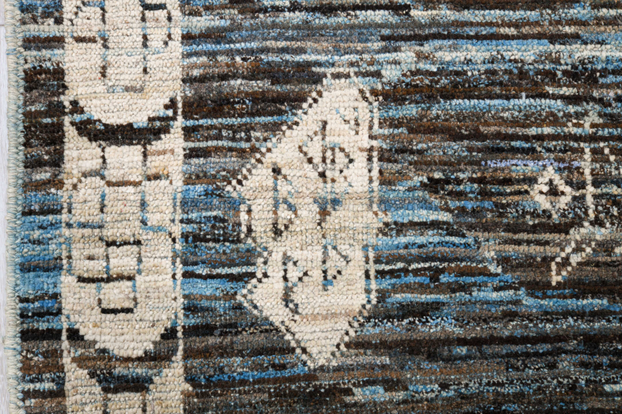 12' x 15' one-of-a-kind handmade vintage Tulu oversize rug. Color palette: charcoal, ivory, slate, blue gray, taupe, black