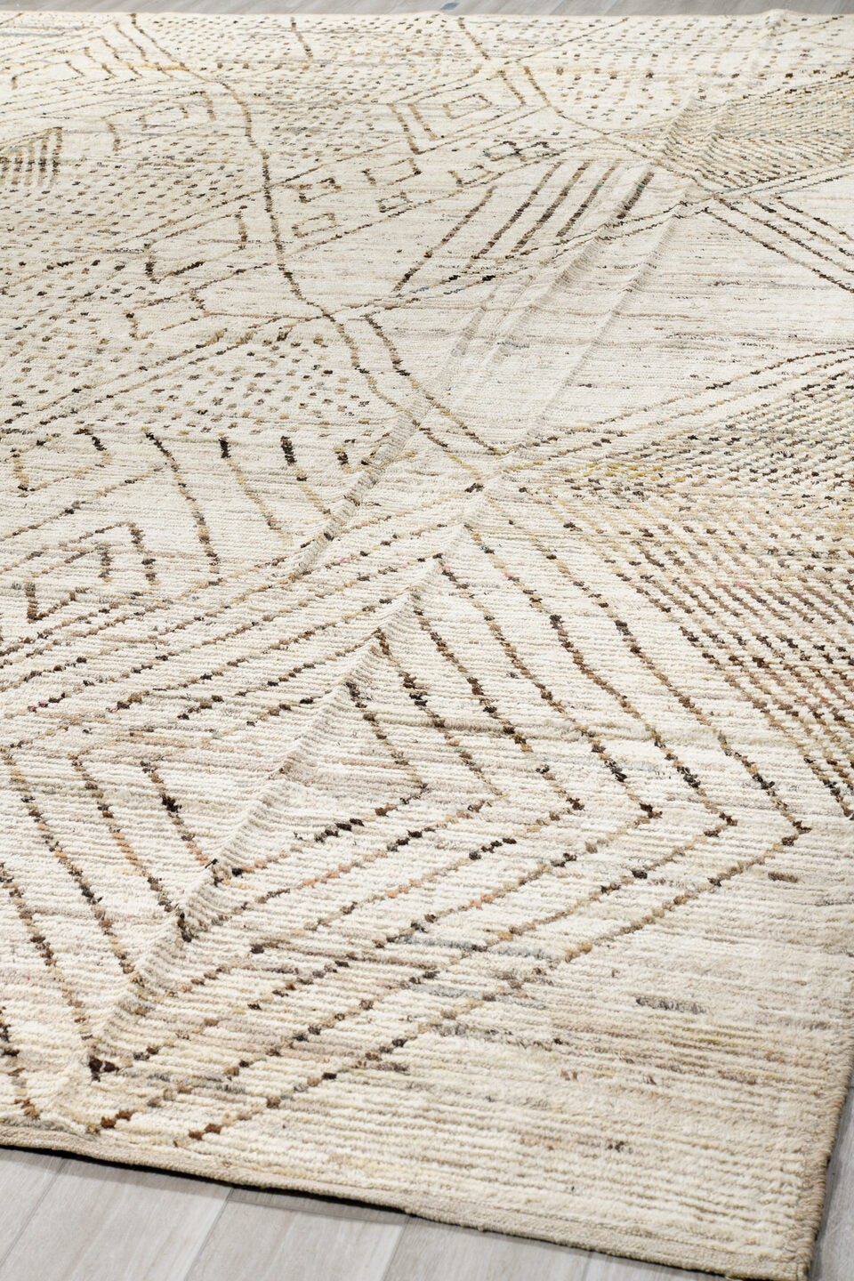 12' x 18' one-of-a-kind handmade vintage Tulu oversize rug. Color palette: ivory, taupe, brown, camel, beige, gray