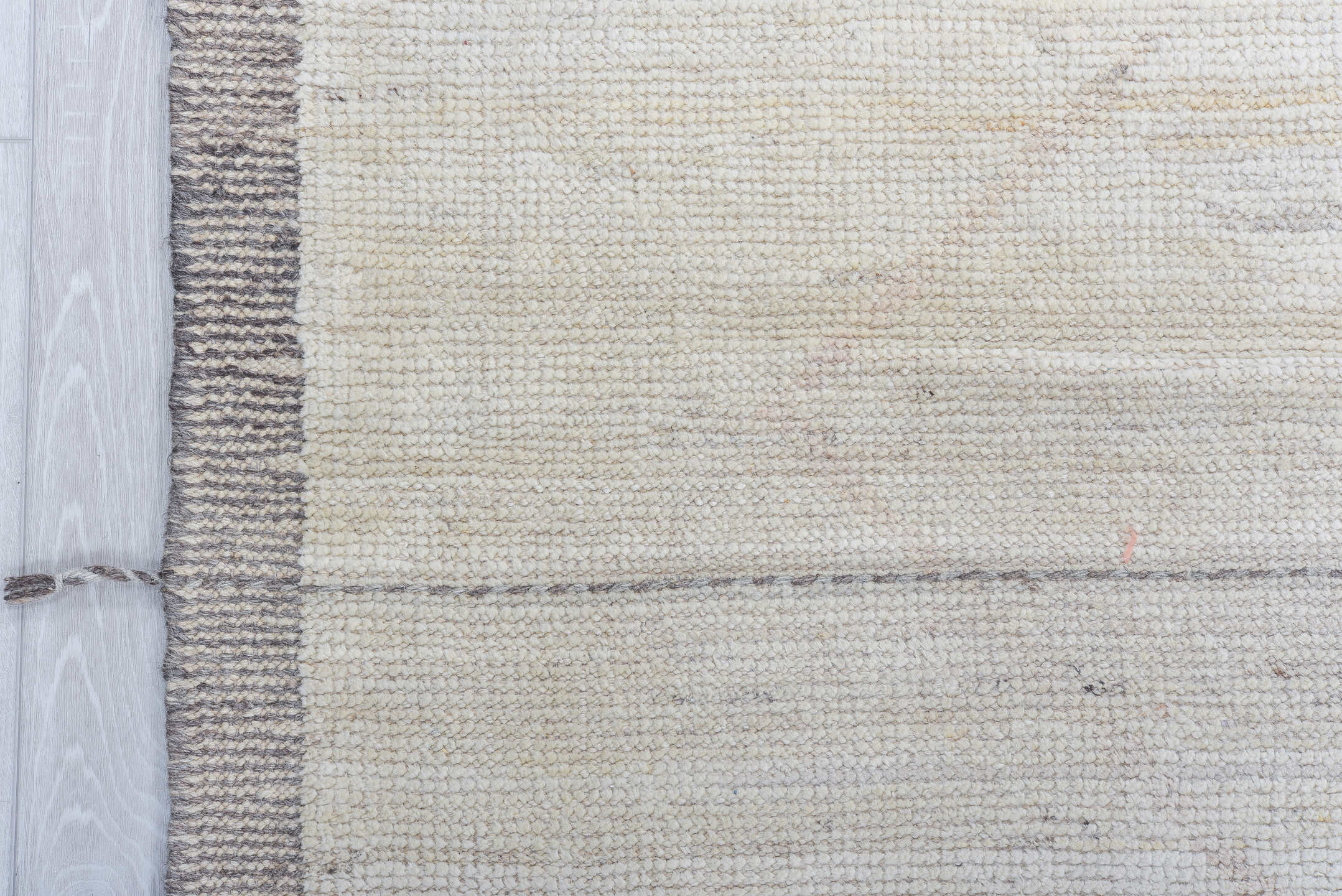 10' x 14' one-of-a-kind handmade vintage Tulu large size rug. Color palette: ivory, taupe, apricot, pale blue, butter yellow