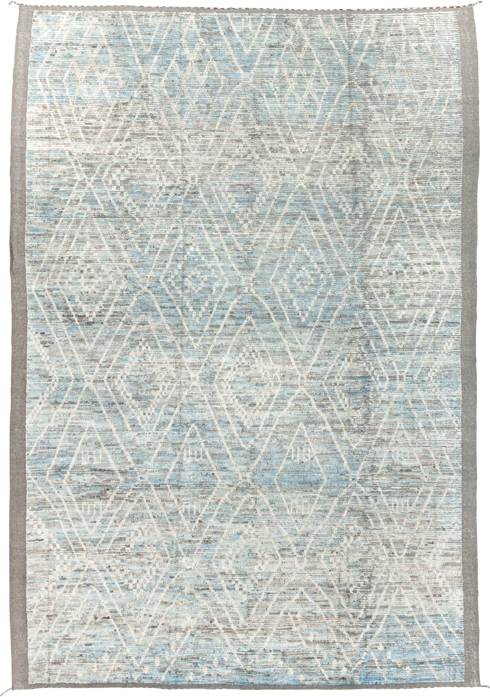 9' x 14' one-of-a-kind handmade vintage Tulu large size rug. Color palette: ivory, ice blue, taupe, silver gray, pale blue