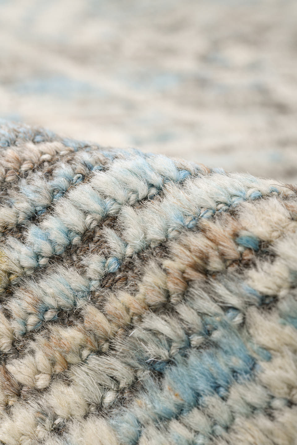 9' x 14' one-of-a-kind handmade vintage Tulu large size rug. Color palette: ivory, ice blue, taupe, silver gray, pale blue