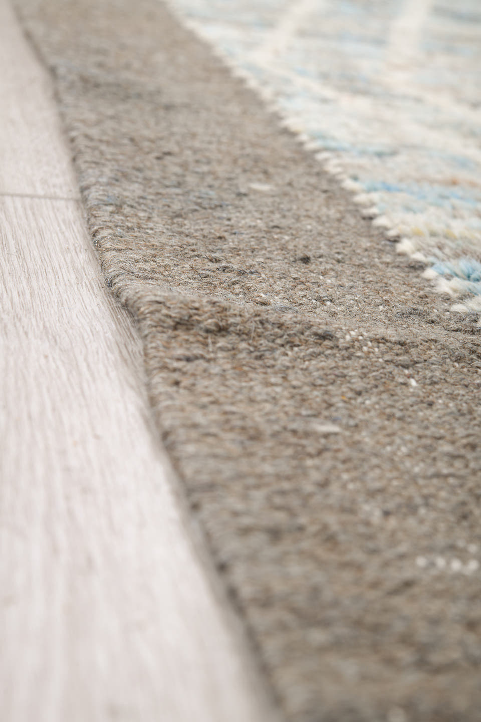 9' x 14' one-of-a-kind handmade vintage Tulu large size rug. Color palette: ivory, ice blue, taupe, silver gray, pale blue