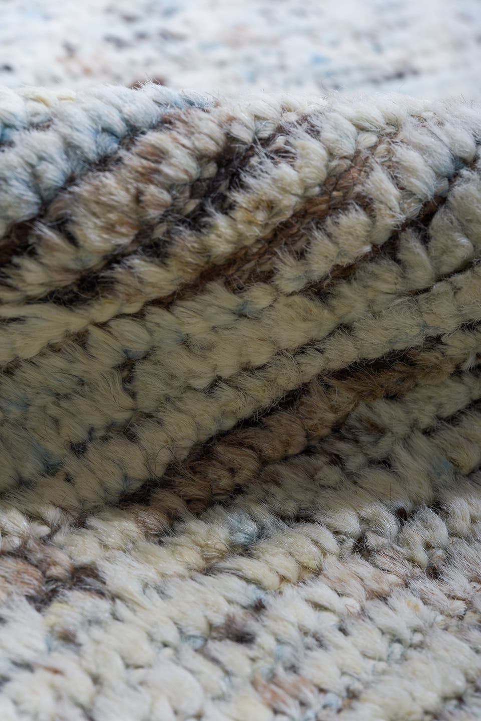 10' x 13' one-of-a-kind handmade vintage Tulu large size rug. Color palette: ivory, pale blue, taupe, brown, gray