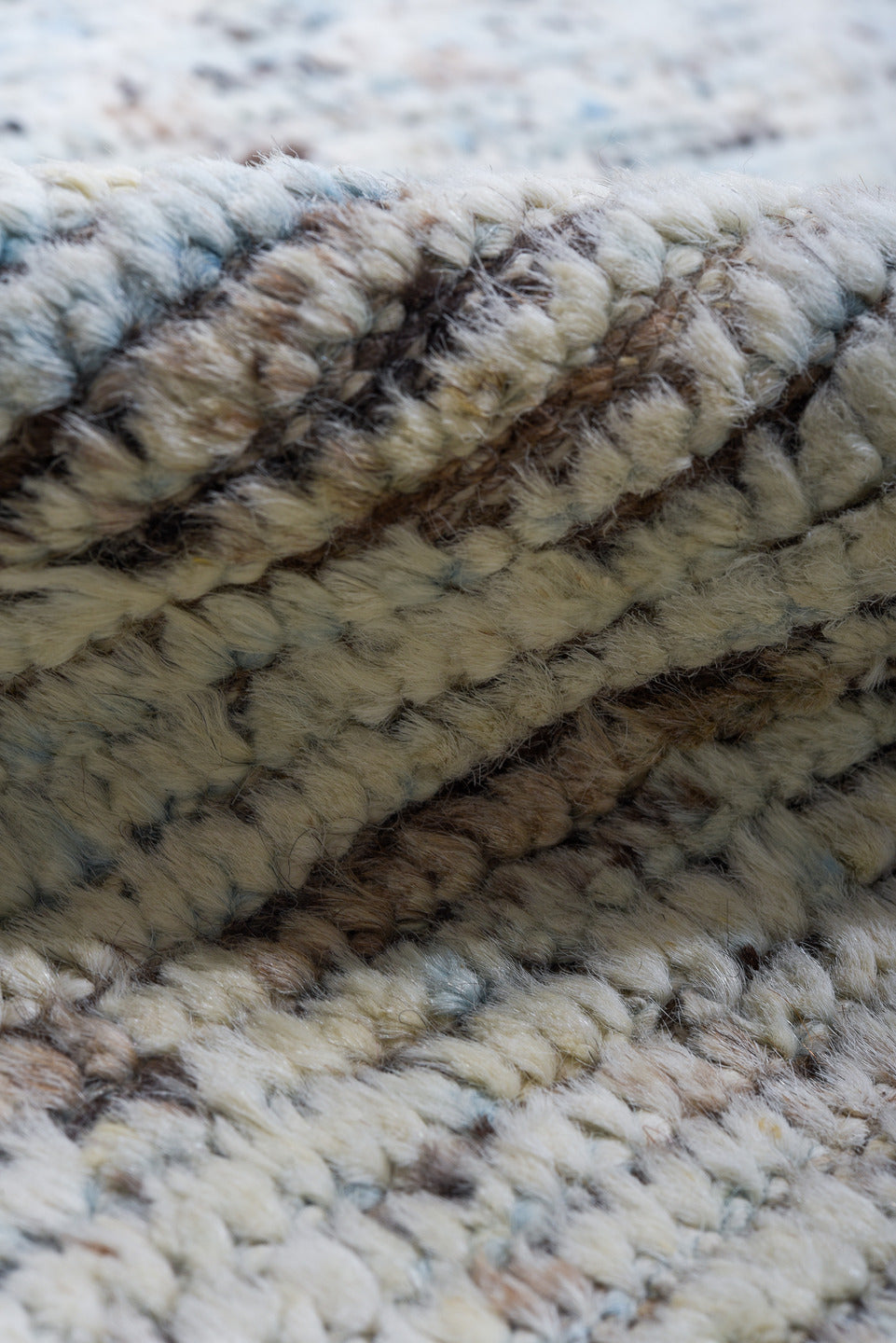 10' x 13' one-of-a-kind handmade vintage Tulu large size rug. Color palette: ivory, pale blue, taupe, brown, gray