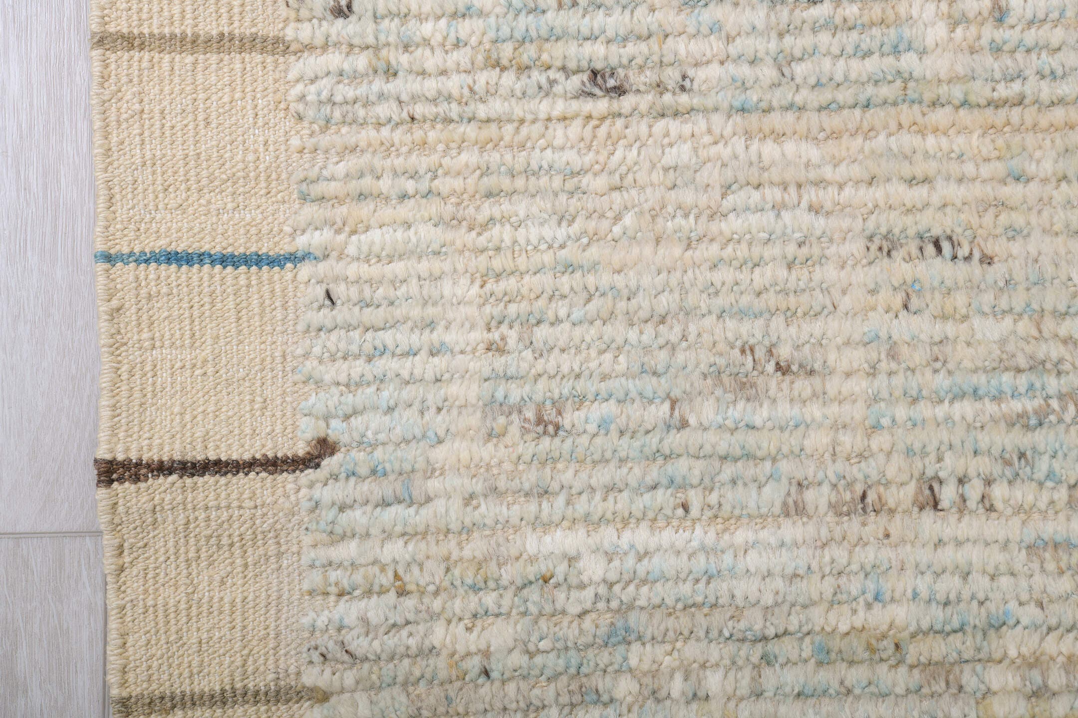 9' x 11' one-of-a-kind handmade vintage Tulu large size rug. Color palette: ivory, cream, taupe, pale blue, brown, gray