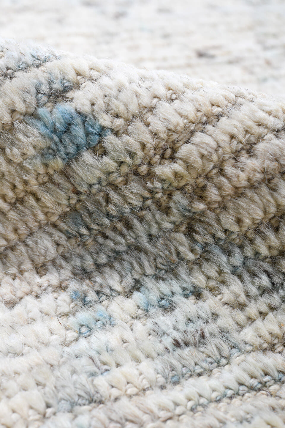12' x 14' one-of-a-kind handmade vintage Tulu oversize rug. Color palette: ivory, pale blue, taupe, cream, light gray