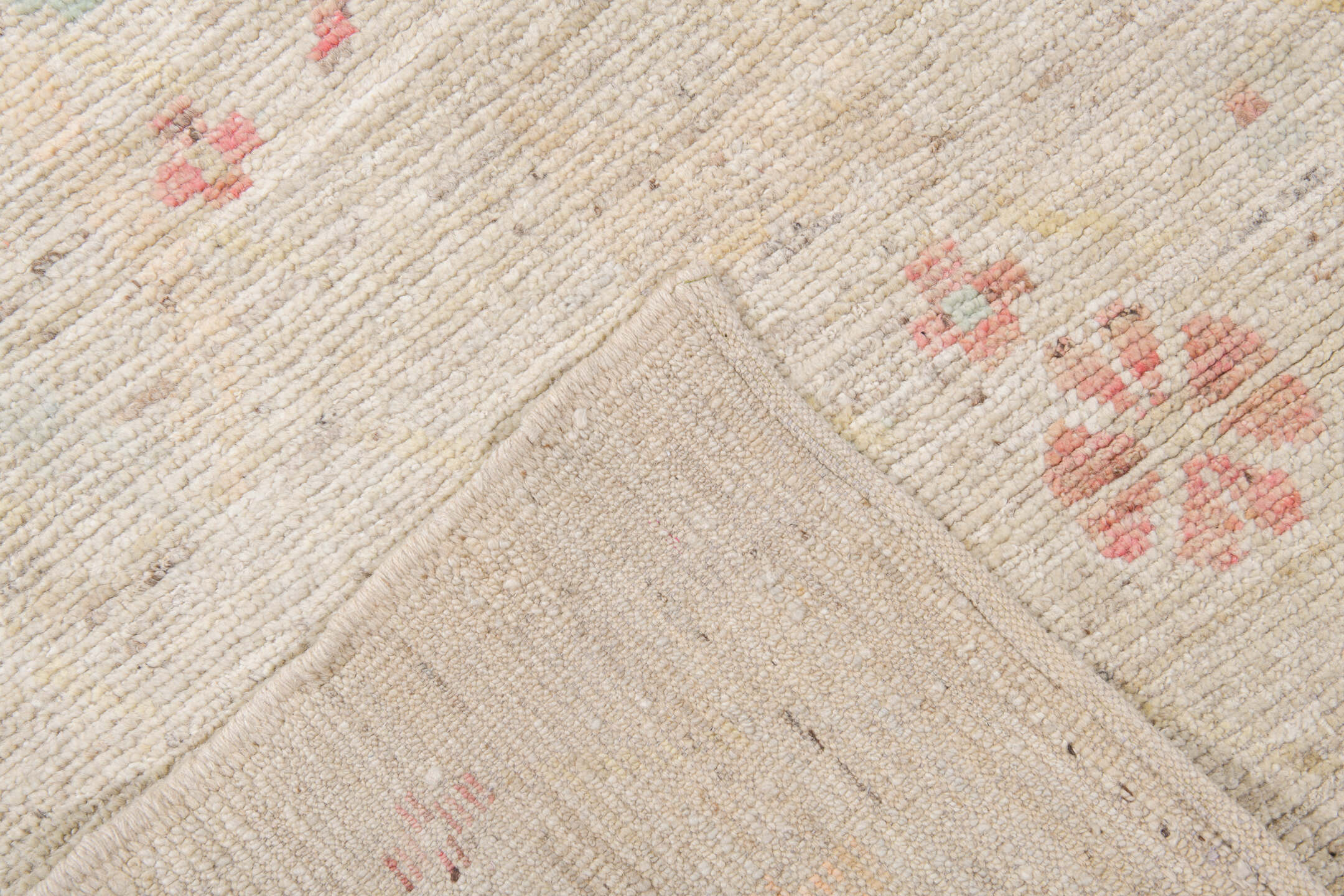 10' x 13' one-of-a-kind handmade vintage Tulu large size rug. Color palette: ivory, blush, pale sage, saffron, beige, pink